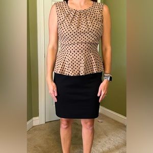 Beautiful black and beige polka dot dress with peplum.
